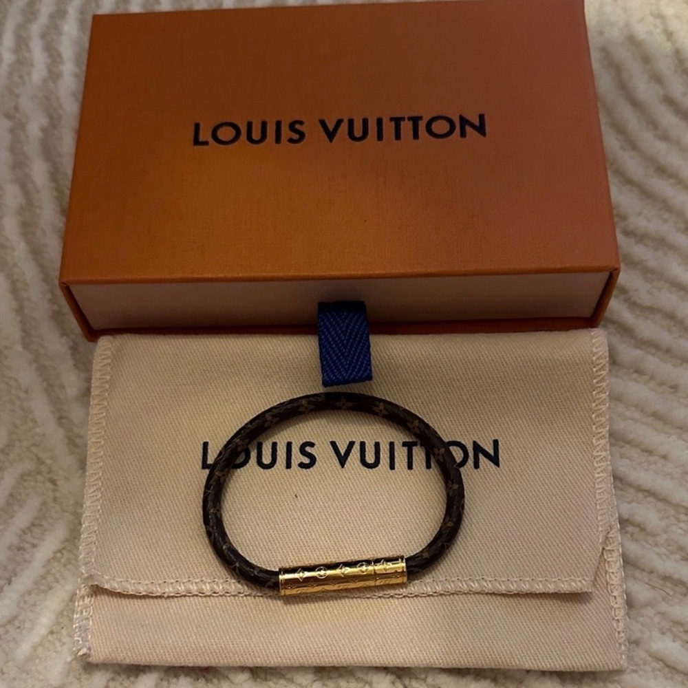 Louis Vuitton brown monogram bracelet with gold-tone tube clasp